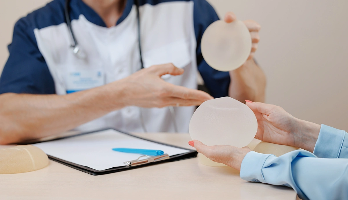 A surgeon discussing different options before breast surgery